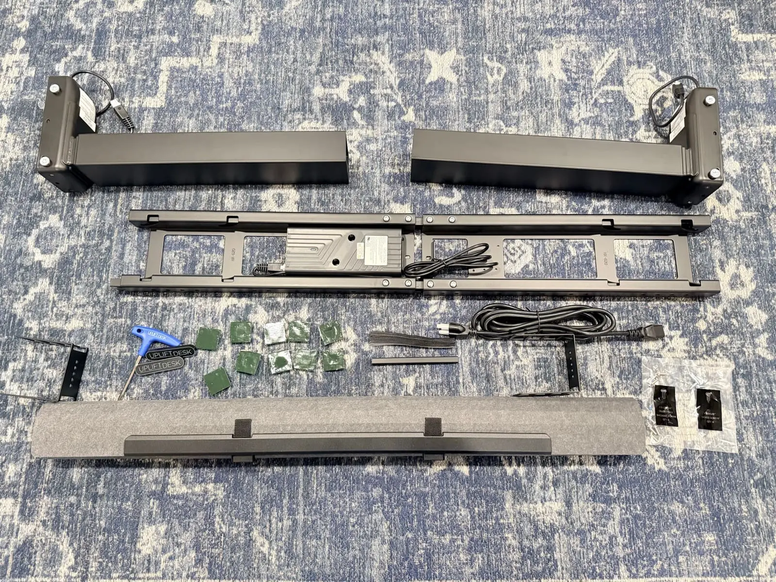 UPLIFT V3 frame parts and hardware laid out for assembly